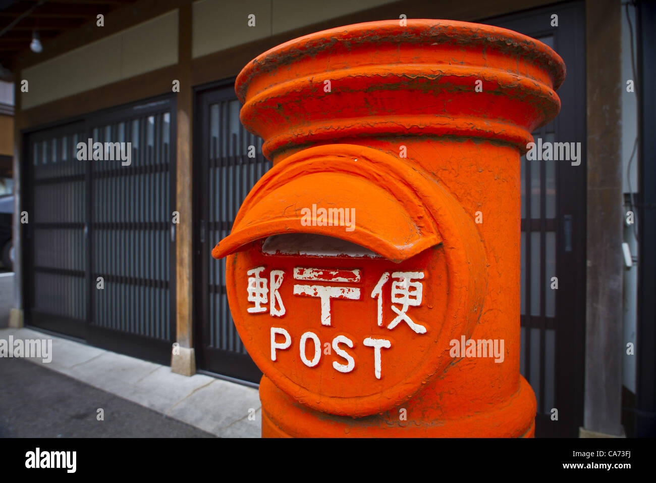 June 15, 2012 - Yamanaka Onsen, Japan - June 15, 2012 - Yamanaka Onsen, Japan - Yamanaka Onsen is a small city in Kaga Prefecture, in western Japan, famous for its onsen, or natural hot spring baths. An old-fashioned mail box. (Credit Image: © David Poller/ZUMAPRESS.com) Stock Photo