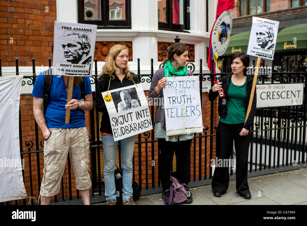 London, UK. 20th June, 2012. Protestors outside of the Ecuadorian Embassy in London. The Wikileaks Founder Julian Assange is there to seek asylum to Ecuador. Stock Photo