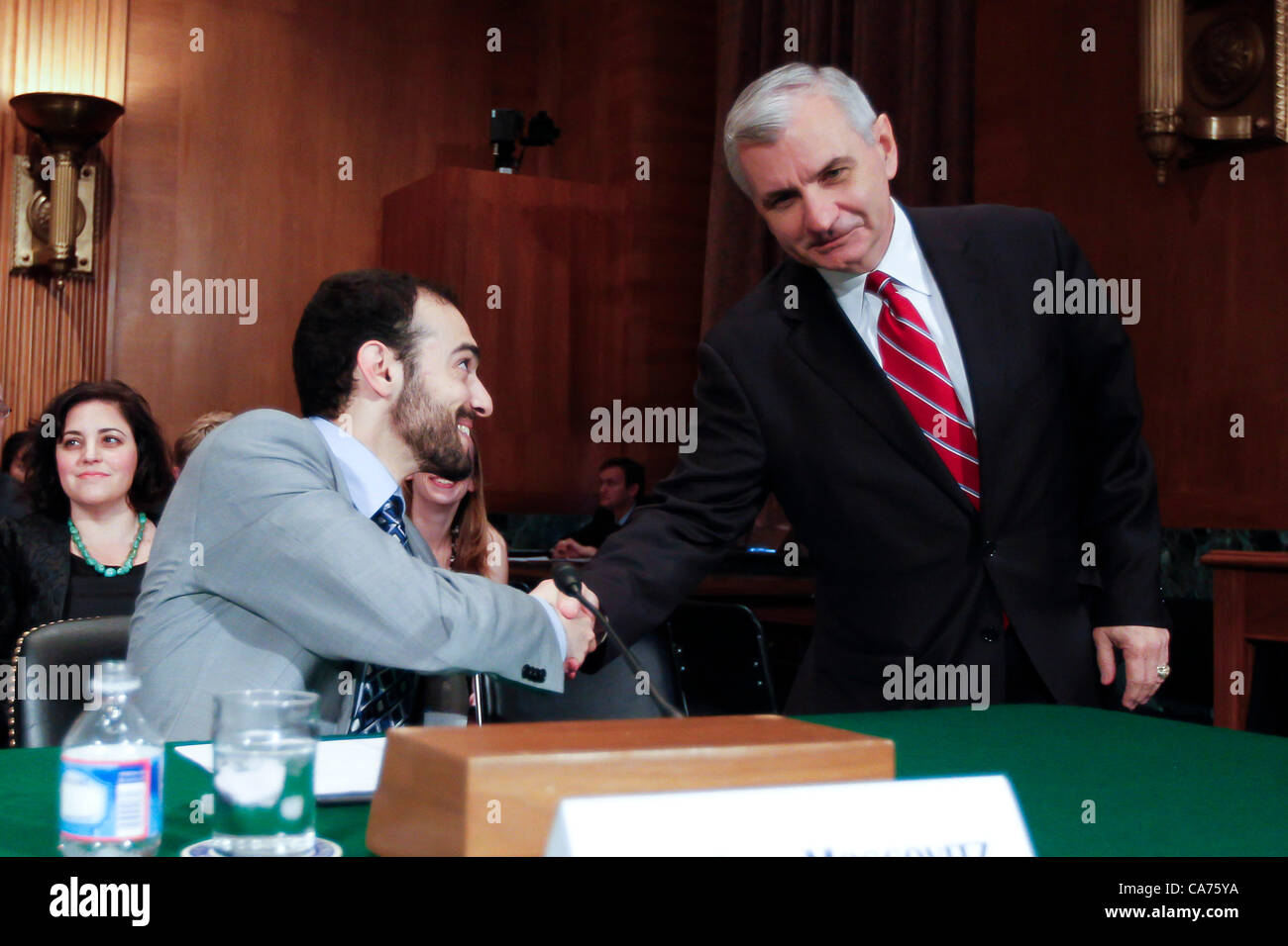 June 20, 2012 - Washington, DC, U.S. - ILAN MOSCOVITZ of The Motley Fool, greets Senator JACK REED prior to the Senate Securities, Insurance and Investment Subcommittee hearing on ''Examining the IPO Process: Is It Working for Ordinary Investors? (Credit Image: © James Berglie/ZUMAPRESS.com) Stock Photo