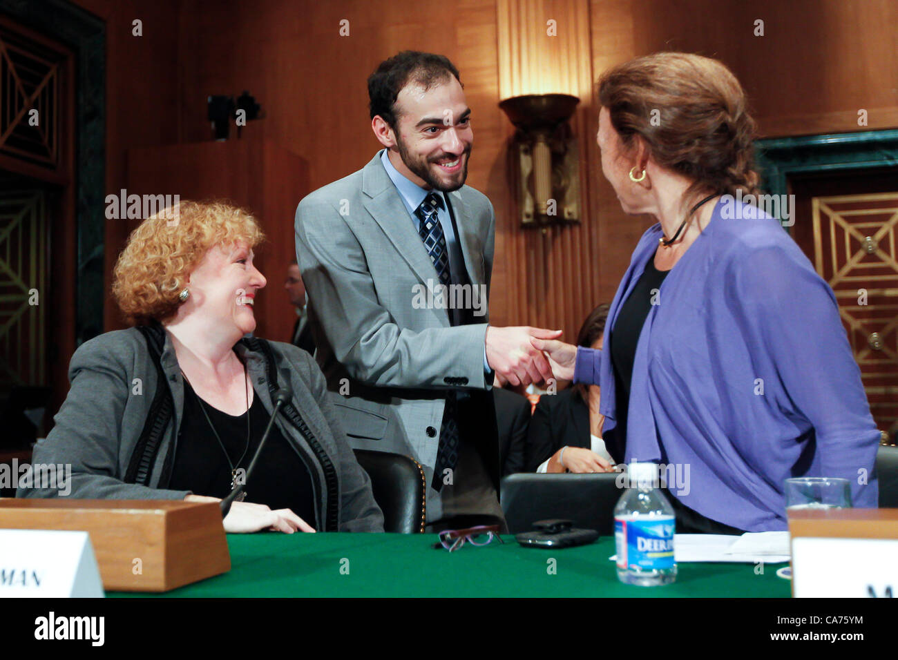 June 20, 2012 - Washington, DC, U.S. - Associate Professor of Finance at DePaul University ANN SHERMAN (left) chats with ILAN MOSCOVITZ of The Motley Fool, and founder and principal of Class V Group, LLC LISE BUYER prior to their testimony in front of the Senate Securities, Insurance and Investment Subcommittee hearing on ''Examining the IPO Process: Is It Working for Ordinary Investors? (Credit Image: © James Berglie/ZUMAPRESS.com) Stock Photo