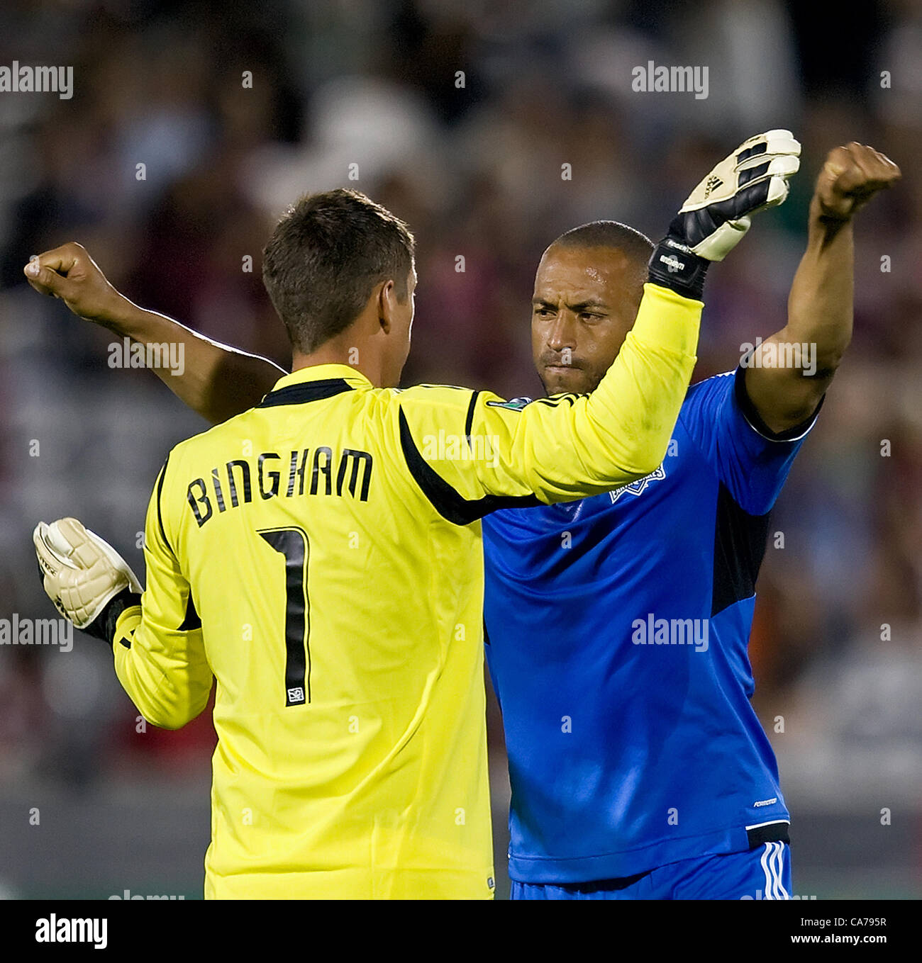 June 20, 2012 - Commerce City, CO, USA - Earthquakes GK DAVID BINGHAM, left, gets congrats from team mate VICTOR BERNARDEZ, right, after the game at Dick's Sporting Goods Park Wed. evening. The Rapids lose to the Earthquakes 2-1. (Credit Image: © Hector Acevedo/ZUMAPRESS.com) Stock Photo