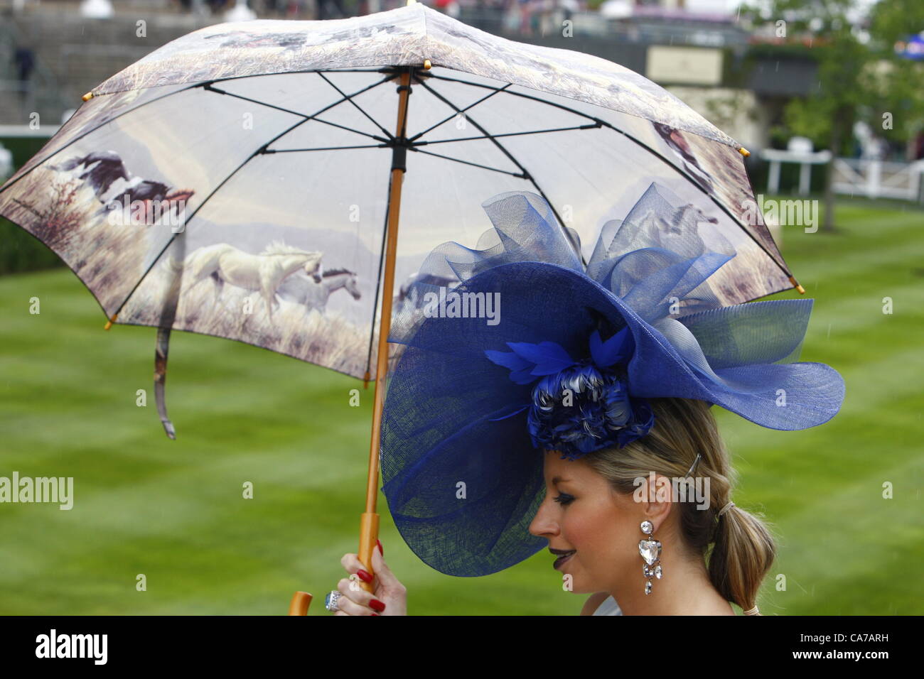 June 21, 2012. Ascot, Windsor, UK. A racegoer in an elaborate blue hat during Ladies Day Royal Ascot Festival at Ascot racecourse.  Stock Photo