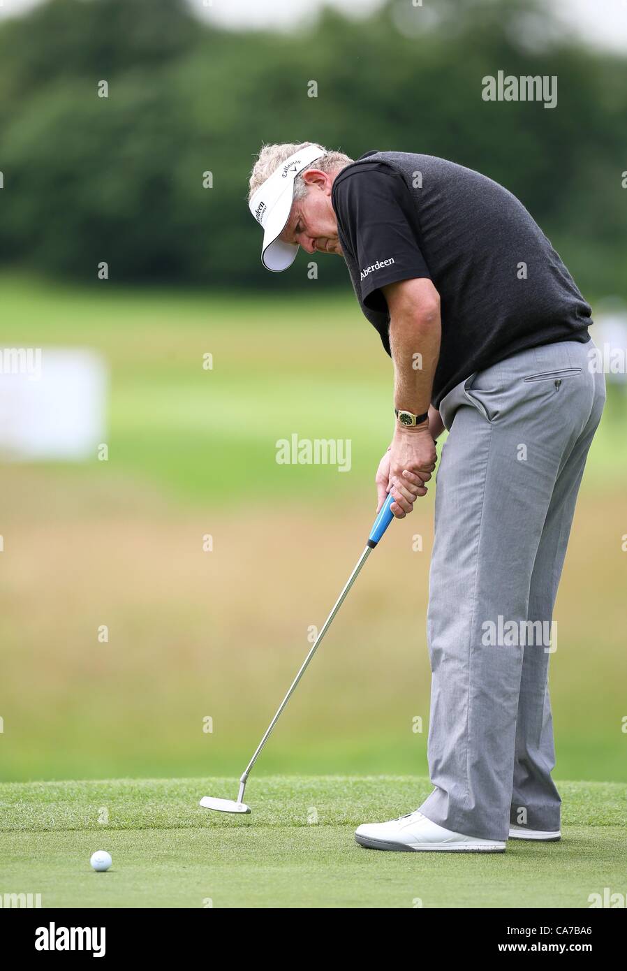 21.06.2012. Pulheim, Cologne, Germany. Scottish golfer Colin Montgomerie  putting during the International open at golf club Gut Laerchenhof in  Pulheim near Cologne, Germany, 21 June 2012. World class golfers of the  European