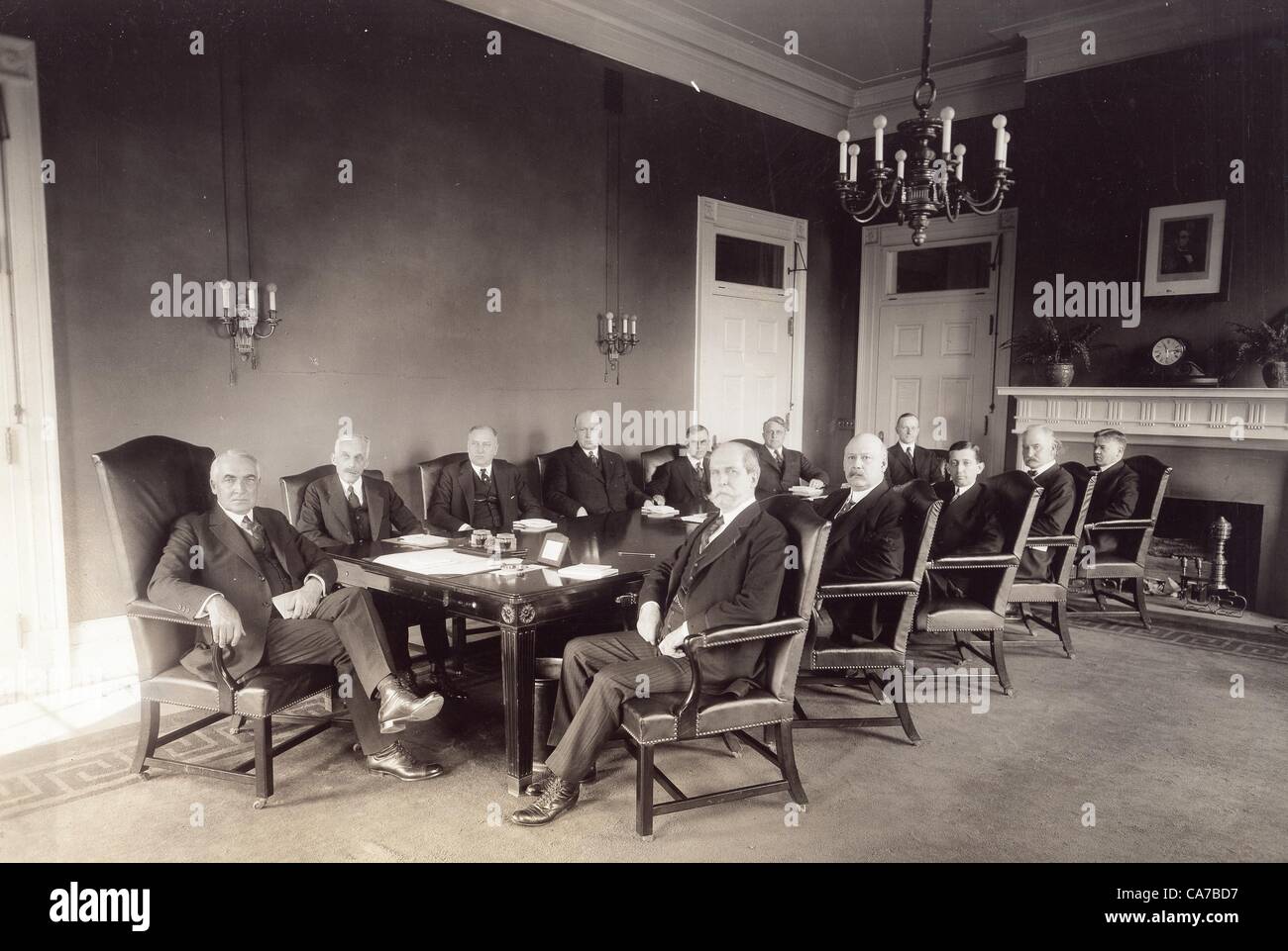 WARREN G. HARDING.The memmbers of pres. Harding's cabinet are seated here from left to right: Andrew W. Mellon (sec. of Treas.) , Harry Daughterty (attorney general) , Edwin Denby (sec. of Navy) , Henry Wallace (sec of Agriculture) , James J. Davis (sec. of Labor) , Calvin Coolidge (vice pres.) , Herbert Hoover (sec. of commerce), Albert Fall (sec. of interior) , Will Hays (postmaster general) , Hubert Weeks (sec. of War) , Charles Evans Hughes (sec. of state).Supplied by   Photos inc.(Credit Image: Â© Supplied By Globe Photos Inc/Globe Photos/ZUMAPRESS.com) Stock Photo