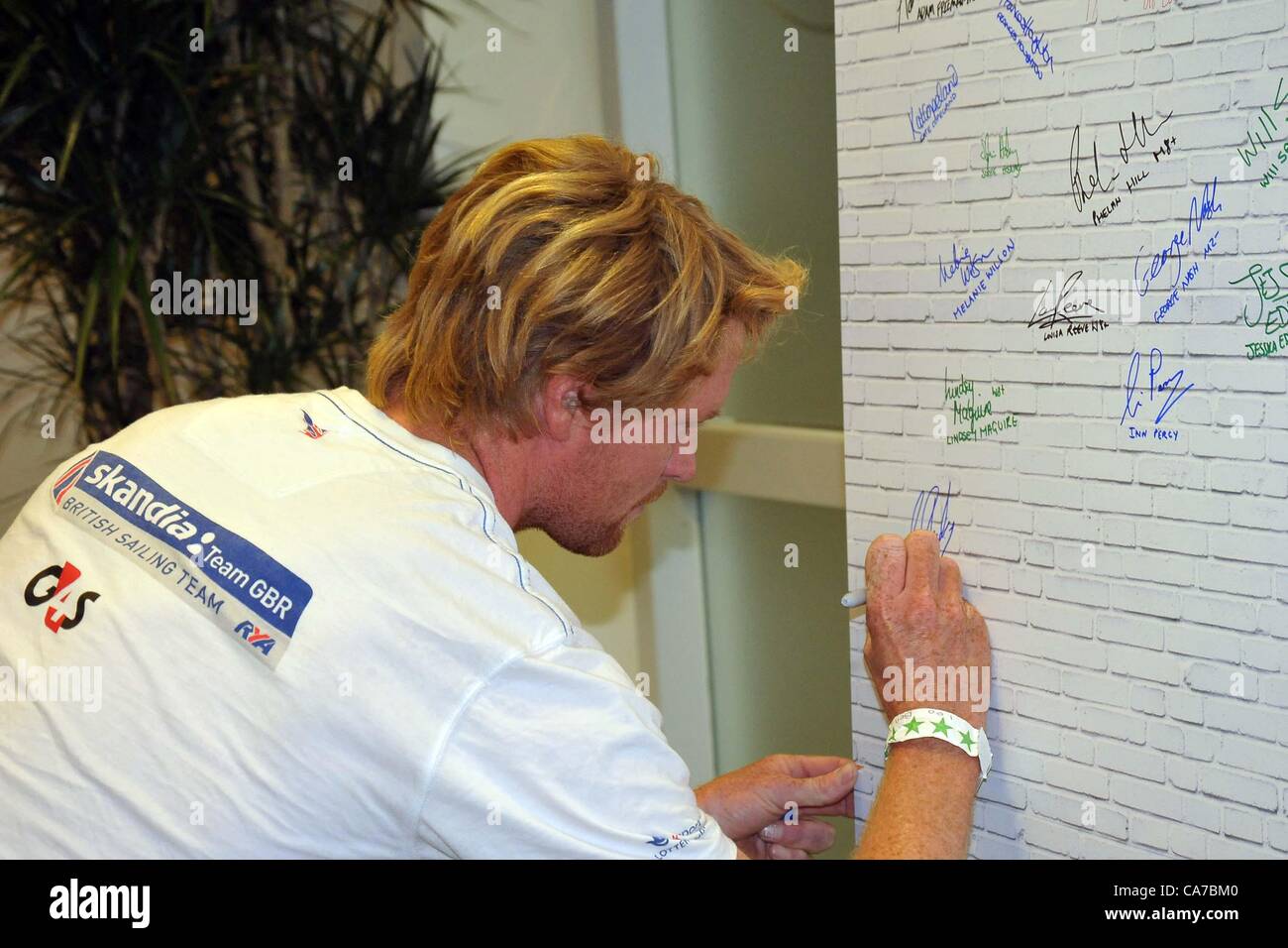 Ben Rhodes signing the Athletes wall of fame. Team GB kitting out day.Team GB Preparation Camp.  Loughborough University. Loughborough. Leicestershire. 19/06/2012. MANDATORY Credit Peter Reynolds/Sportinpictures - NO UNAUTHORISED USE - 07837 394578 Stock Photo