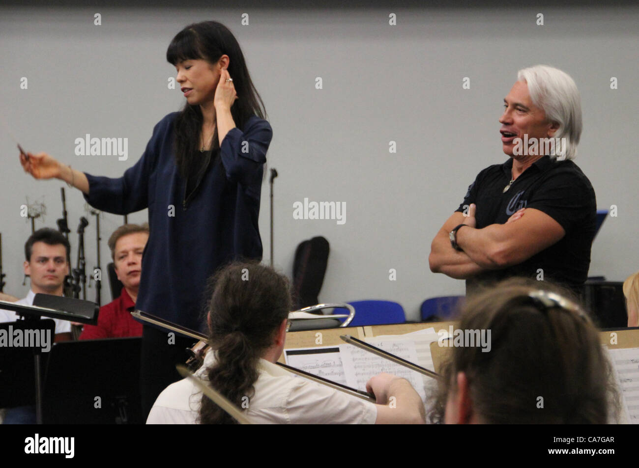 June 18, 2012 - St. Petersburg, Russia - June 18,2012. St.Petersburg,Russia. Pictured: American conductor Sarah Hicks (l) at the rehearsal of the 'Opera Bouquet' musical project in St.Petersburg. (Credit Image: © PhotoXpress/ZUMAPRESS.com) Stock Photo