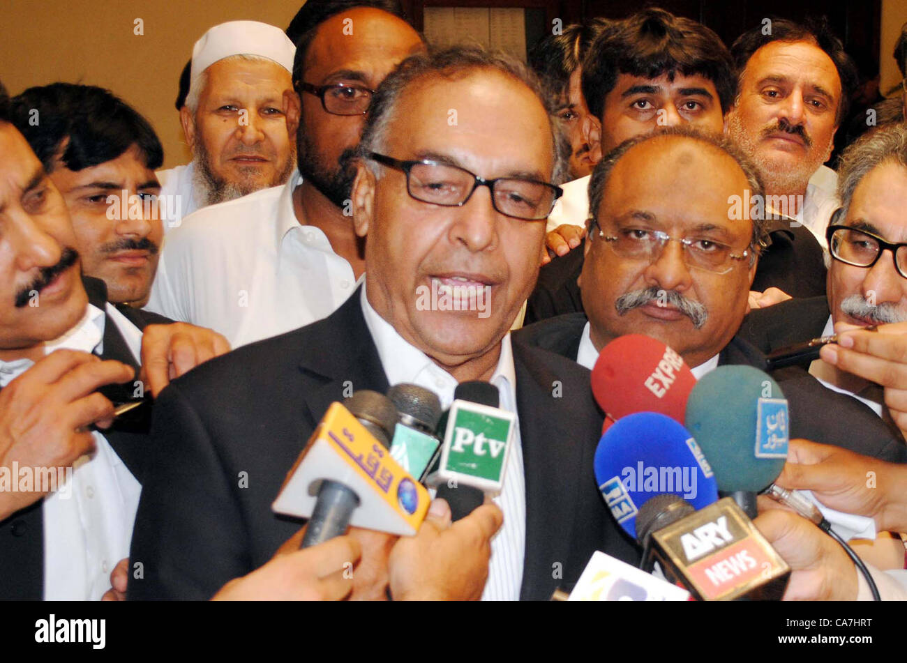 Makhdoom Shahab-ud-Din talking to the media after a  hearing case in Peshawar High Court on Friday, June 22, 2012. Stock Photo