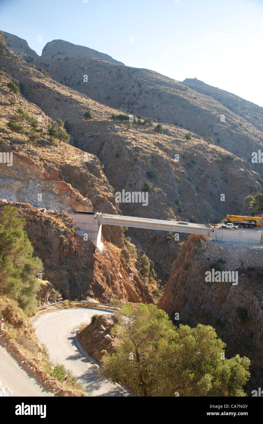 Constructing new bridge spanning the gorge in Rodakino on the south coast of Crete, Greece, under construction Stock Photo