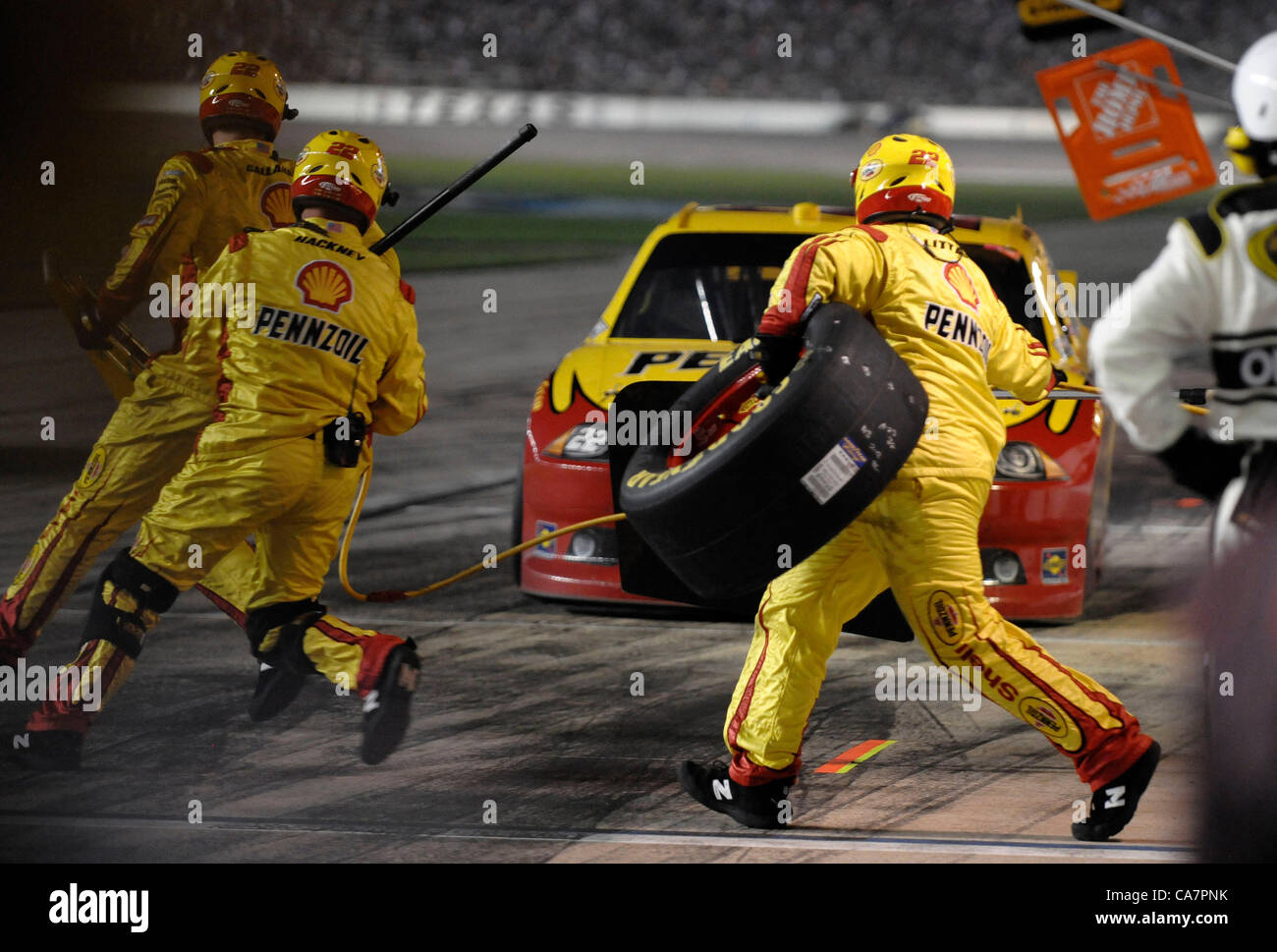 April 14, 2012 - Fort Worth, TX, USA - April 14, 2012 Ft. Worth, Tx. USA. Pit crews scramble during the NASCAR Sprint Cup Samsung 500 race at Texas Motor Speedway in Ft. Worth, Tx. (Credit Image: © Ralph Lauer/ZUMAPRESS.com) Stock Photo