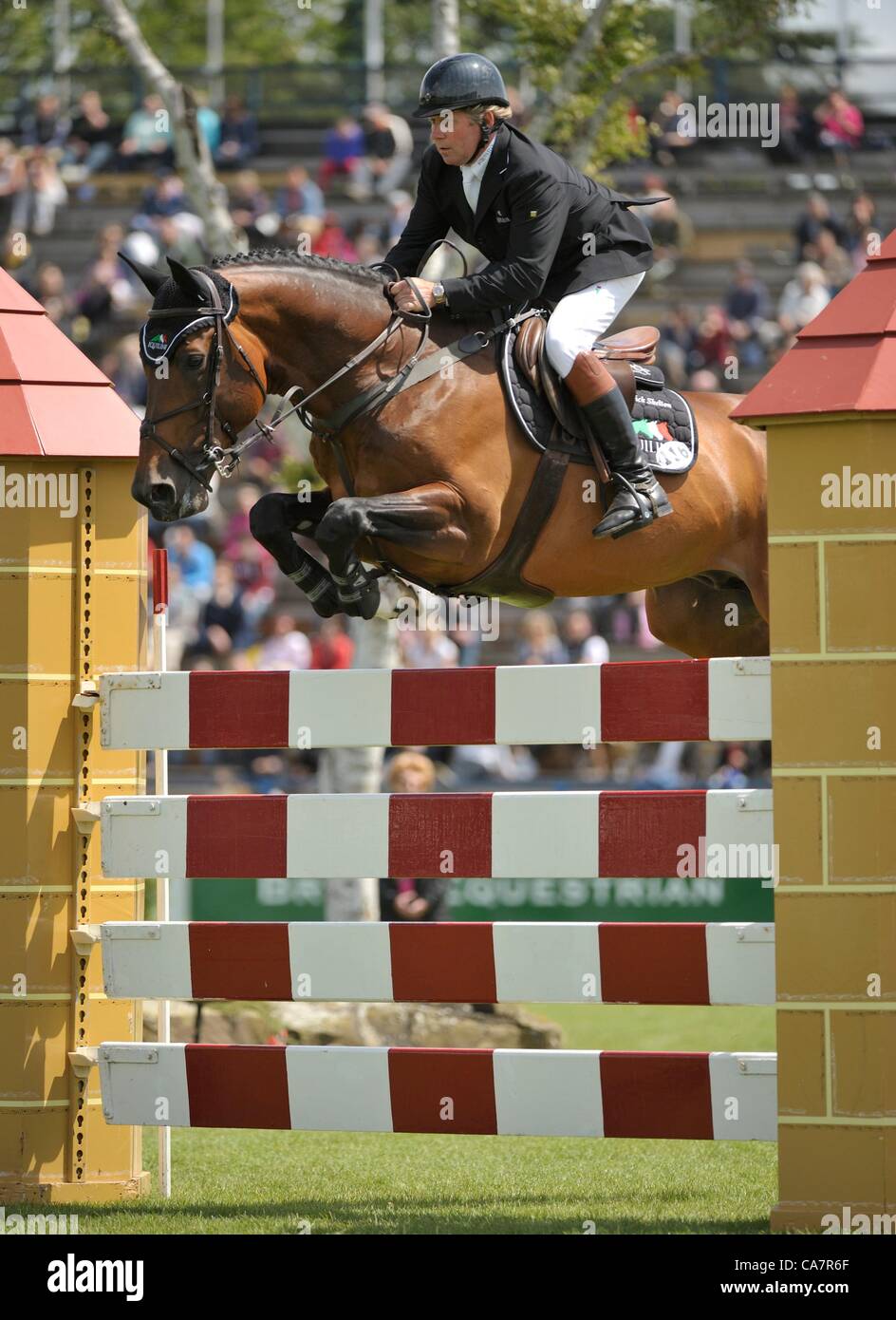 23.06.2012 The All England Jumping Course  Hickstead, England. Big Star ridden by Nick Skelton [GBR] riding to fourth place in The Hickstead Derby Trophy at The British Jumping Derby Meeting. Stock Photo