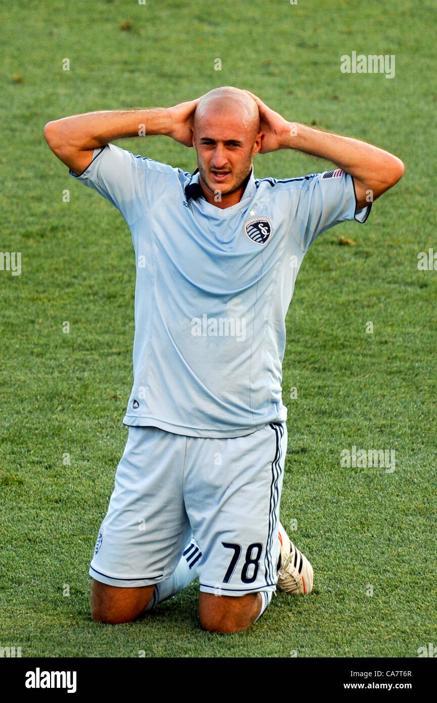Philadelphia, USA. 23 June, 2012. Aurelien Collin of France and playing for the Sporting KC gets up to his knees after a collision on the field during a professional MLS soccer / football match against the Philadelphia Union Stock Photo