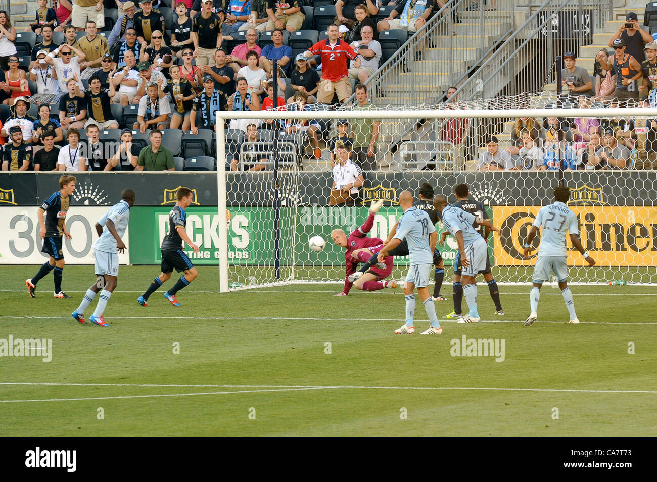Philadelphia, USA. 23 June, 2012. Philadelpia Union forward Jack McInerney scores the 2nd of his two goals during a professional MLS soccer / football match against the Sporting KC of Kansas City. Stock Photo