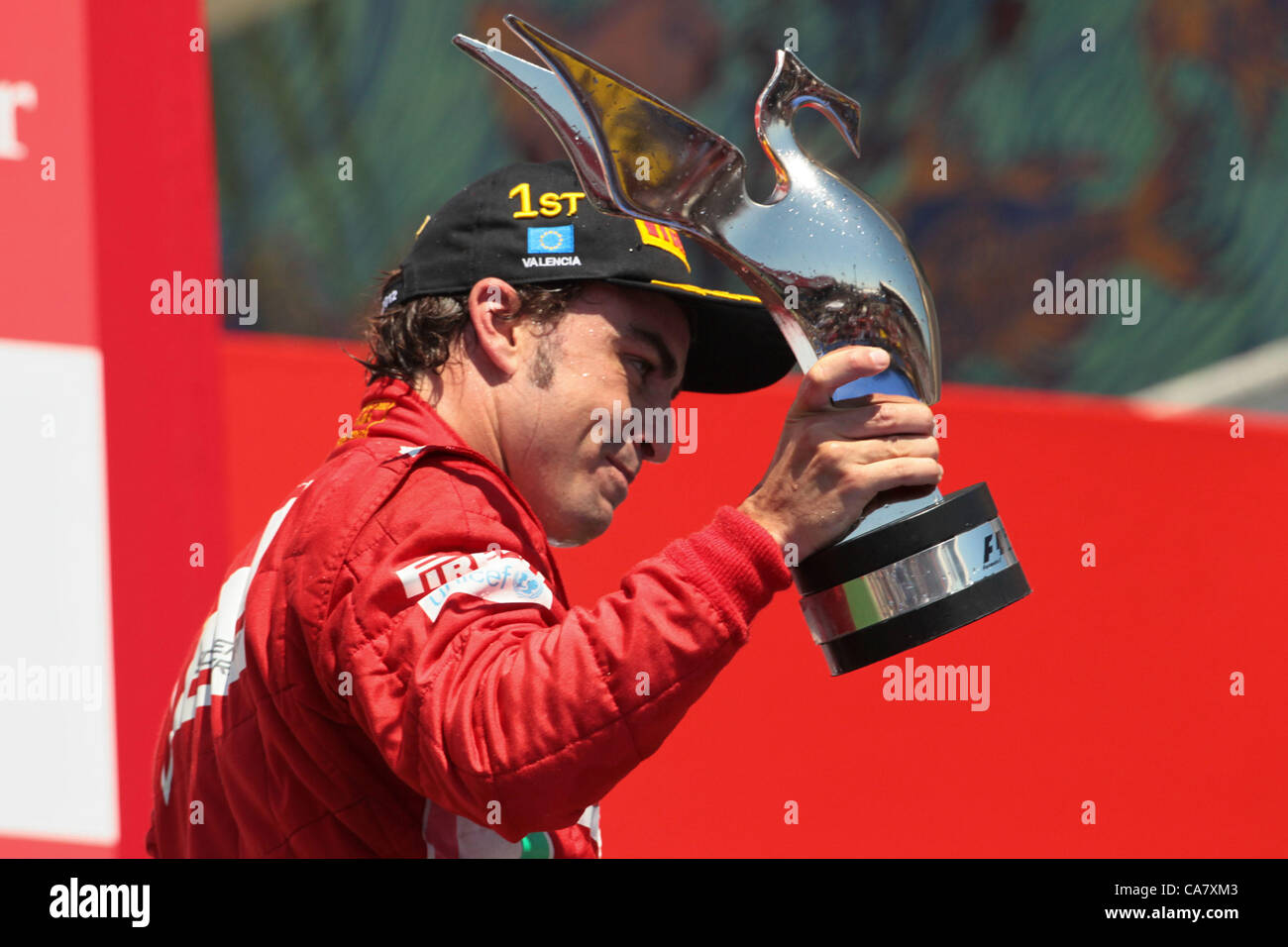24.06.2012.  Valencia. Spain. 2012 Grand Prix Europe Valencia 2012 Formula 1 Grand Prix Europe Valencia 2012 Fernando Alonso on the podium with his trophy as he takes 1st place at the Valencia GP Stock Photo