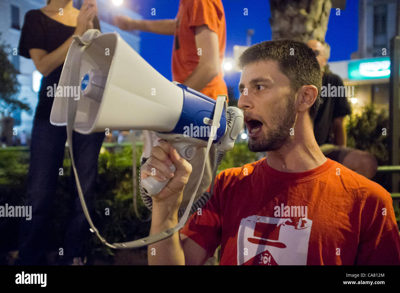 Encouraged by Tel-Aviv counterparts the night before, a few hundred Jerusalem Social Justice activists assemble at Paris Square and march downtown shouting slogans against PM, government and so-called tycoons and disrupting the tram on Jaffa Road. Jerusalem, Israel. 24-June-2012. Stock Photo