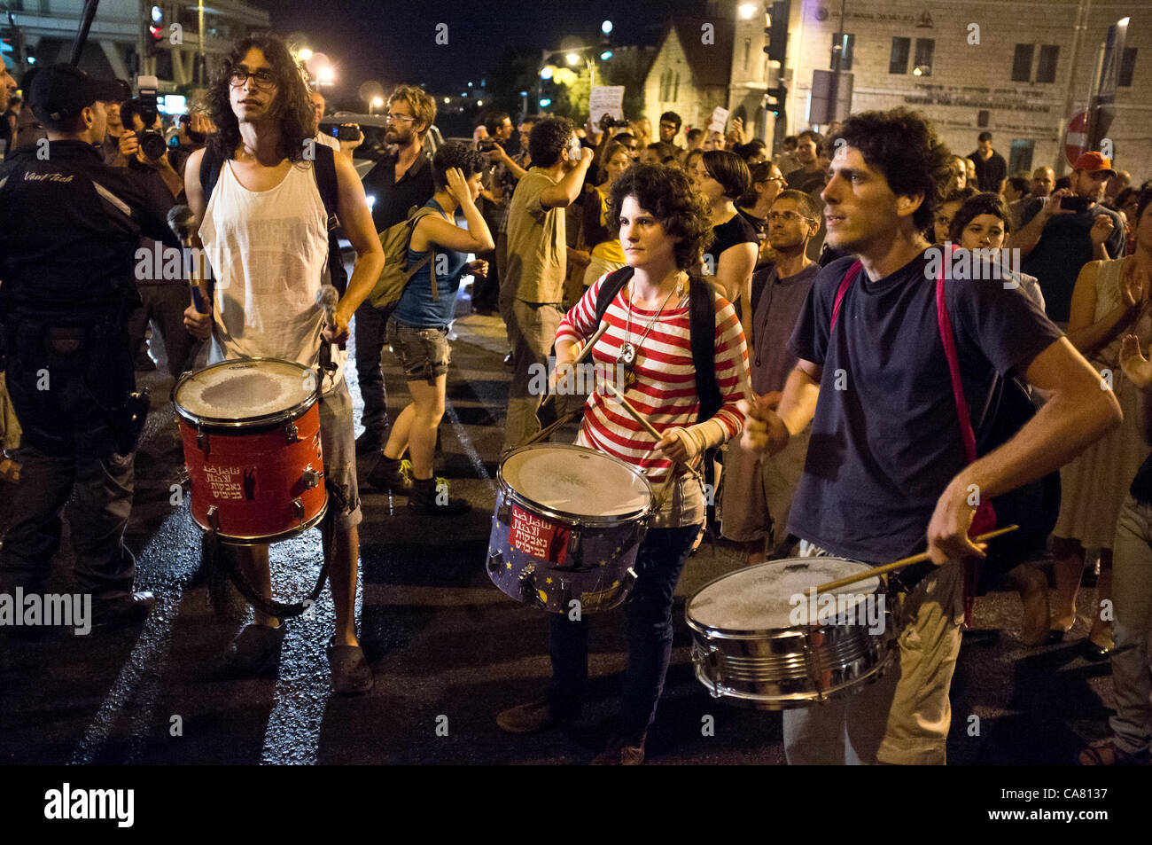 Drummers lead protesters as they leave Paris Square and head downtown. Jerusalem, Israel. 24-June-2012. Stock Photo