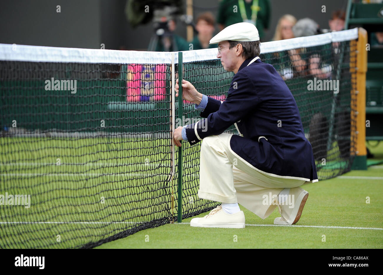 ADJUSTING NET HEIGHT THE WIMBLEDON CHAMPIONSHIPS 20 THE ALL ENGLAND