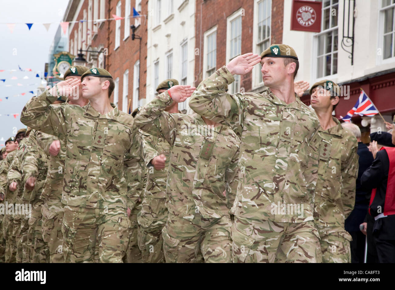Worcester, England, UK. Wednesday 27th June 2012.  Soldiers from 2nd Battalion Mercian Regiment, Grenadier Guards, Queen's Royal Hussars and members of the Royal British legion, parade through the streets of Worcester. Seven soldiers from the city were also given their service medals. Stock Photo