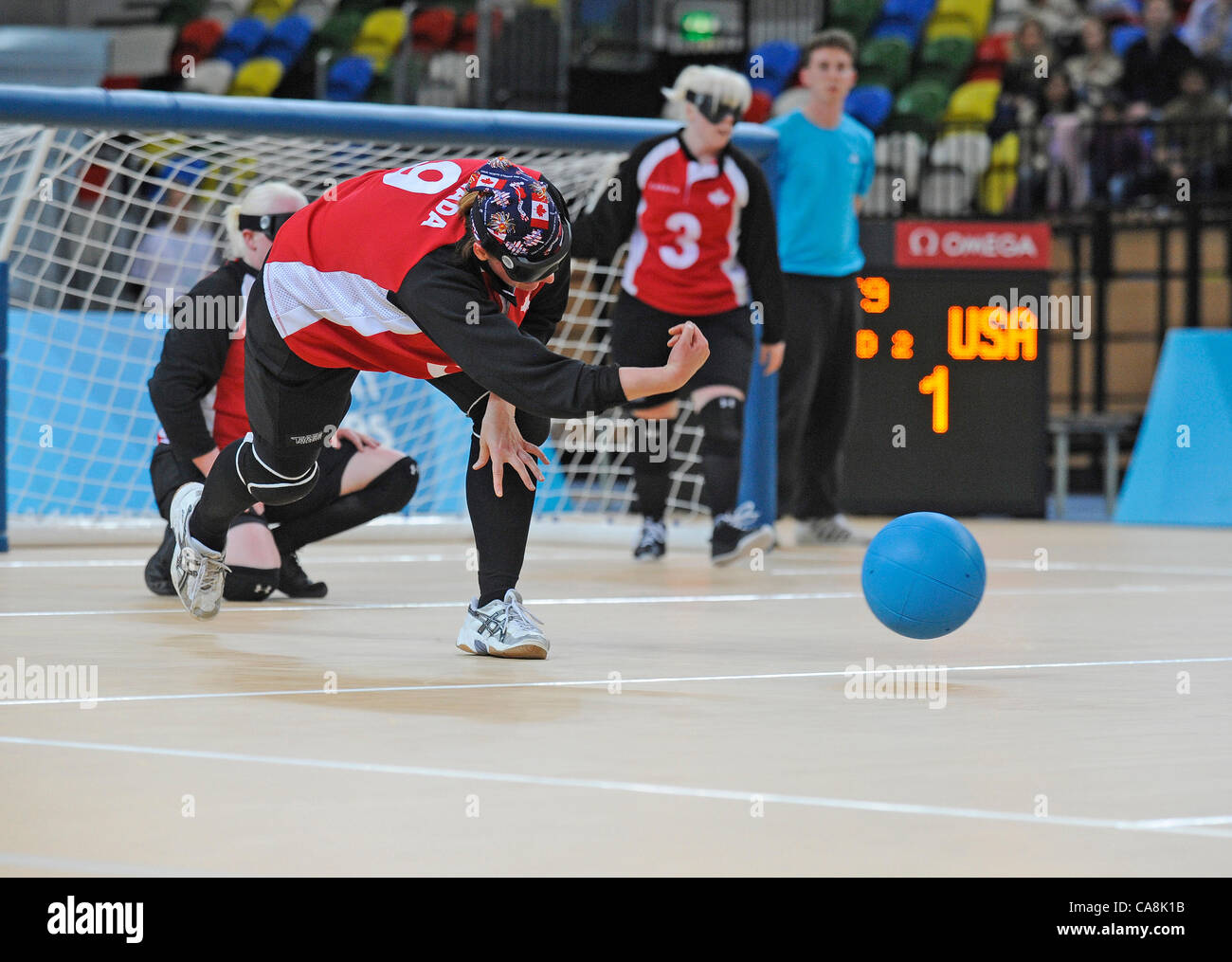 Nancy MORIN (CAN) makes an attacking throw during Canada v USA, The London Prepares Goalball Paralympic Test Event - Poland  v China, Handball Arena, Olympic Park,  London, England December 3, 2011. Canada went on to win 5 - 1  Handball is played by blind or partially sighted athletes wearing an eye Stock Photo