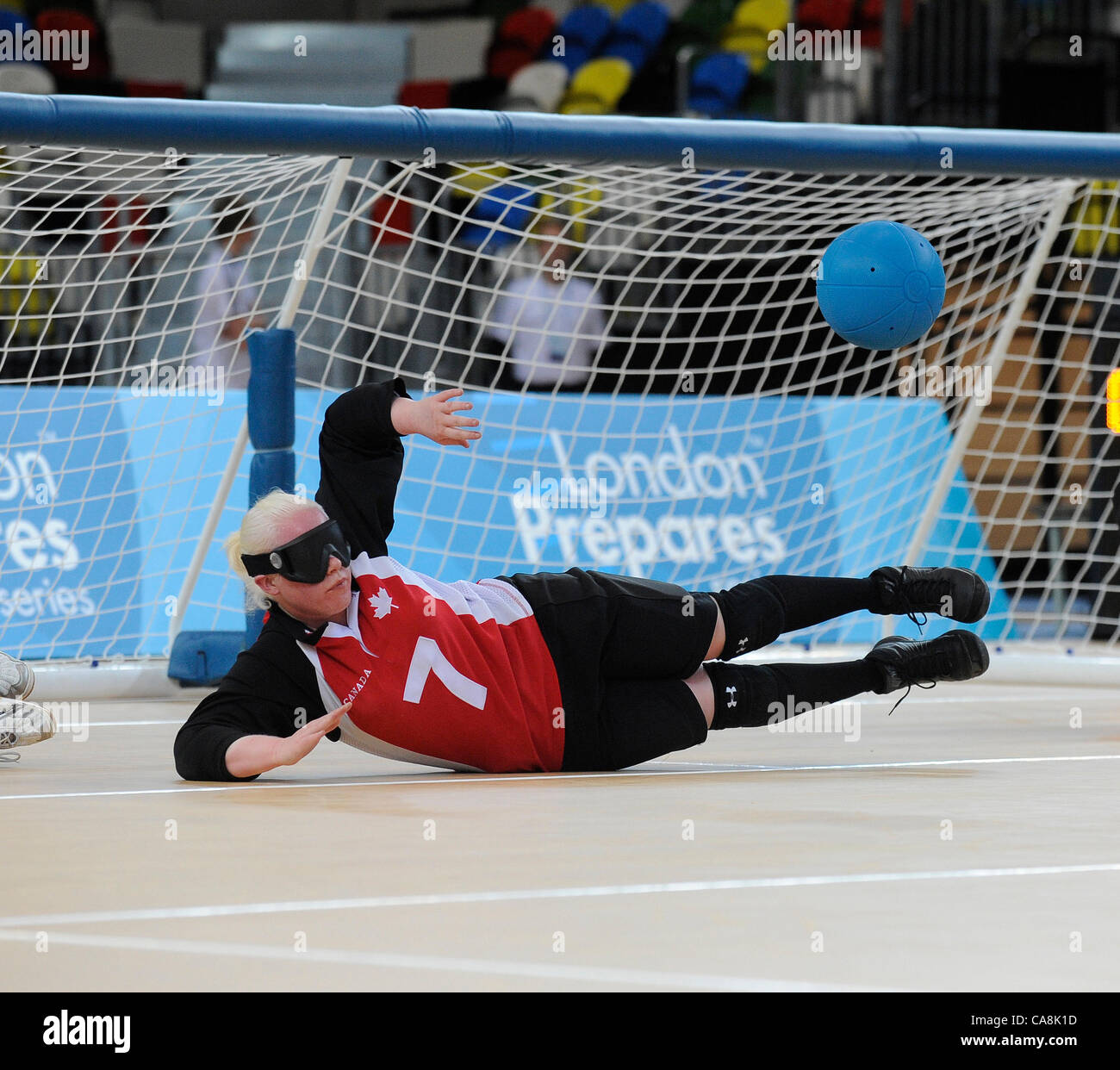 Amy KNEEBONE (CAN) makes a save during Canada v USA, The London Prepares Goalball Paralympic Test Event - Poland  v China, Handball Arena, Olympic Park,  London, England December 3, 2011. Canada went on to win 5 - 1  Handball is played by blind or partially sighted athletes wearing an eye shade to e Stock Photo