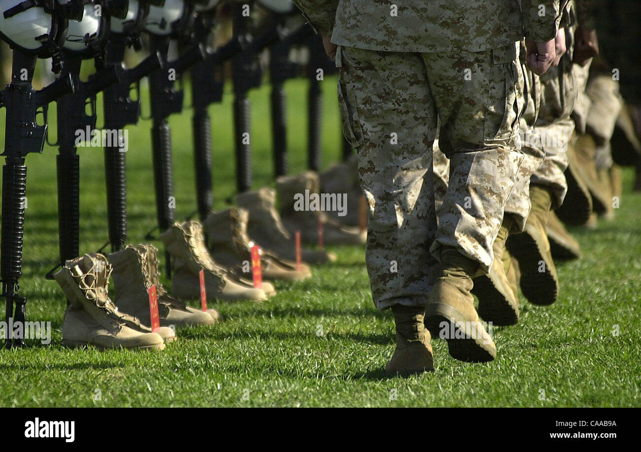 (Published 12/03/2003, B-1; SignOn Gallery: 12/08/2003) Marines march near 15 boots representative of the 15 Marines from the Third Marine Aircraft Wing who died in Operation Iraqi freedom.  Those marines were honored during a memorial service Tuesday December 2, 2003 at MCAS Miramar.  UT/John Gasta Stock Photo