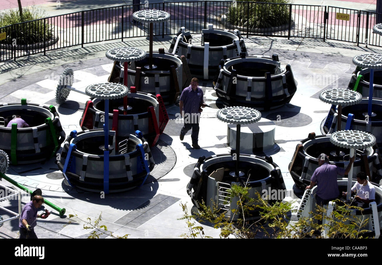 (PUBLISHED 04/02/2003, NC-1; NI-1): Technicians prepare the BIONICLE Blaster at Legoland in Carlsbad (this is the official name with BIONICLE in all caps according to PR sources) on Tuesday. Technicians are putting the finishing touches on the ride that is expected to open on Thursday. UT photo by E Stock Photo