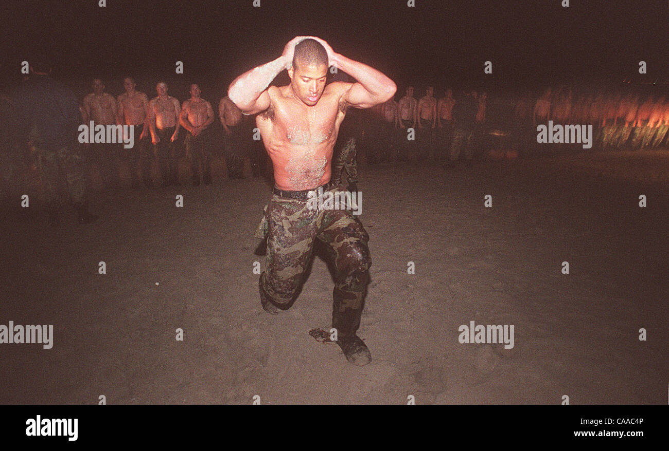 SPECIAL FORCES 160709x28 .............. SEAL trainee, OS3 David Goggins (not in training) is singled out my medical personnel to perform additional stretching exercise as a method to try and warm up his body temperture.  UNION-TRIBUNE NELVIN CEPEDA (PUBLISHED CAPTION: September 18, 2000, A-13: Suffe Stock Photo