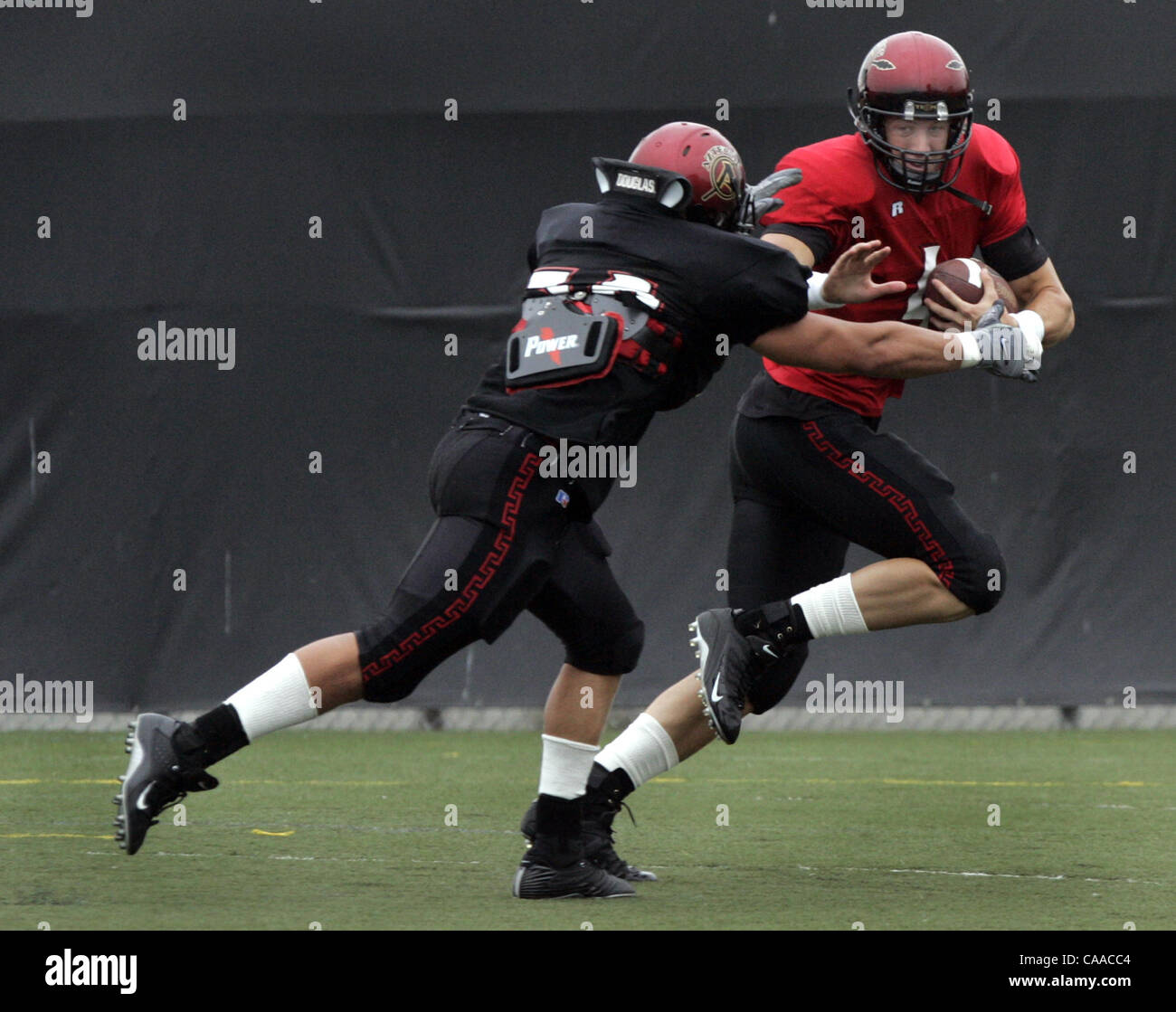 First scrimmage of 2005 Aztec Football training camp. Quarerback #4 ...