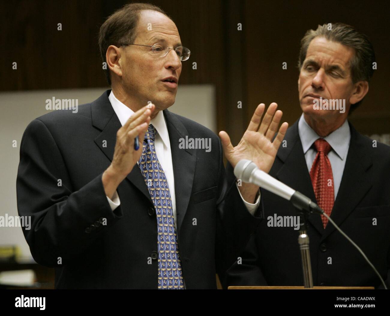 (PUBLISHED 01/20/2005, B-2:1,2,7; B-12:6)Attorneys Michael Prancer (cq)(left) and Jan Ronis (cq)(right) during a hearing in El Cajon Superior Court Tuesday for their no show clients who alledgedly forged  their court ordered community work order. Roni Galgano/Union-Tribune Stock Photo