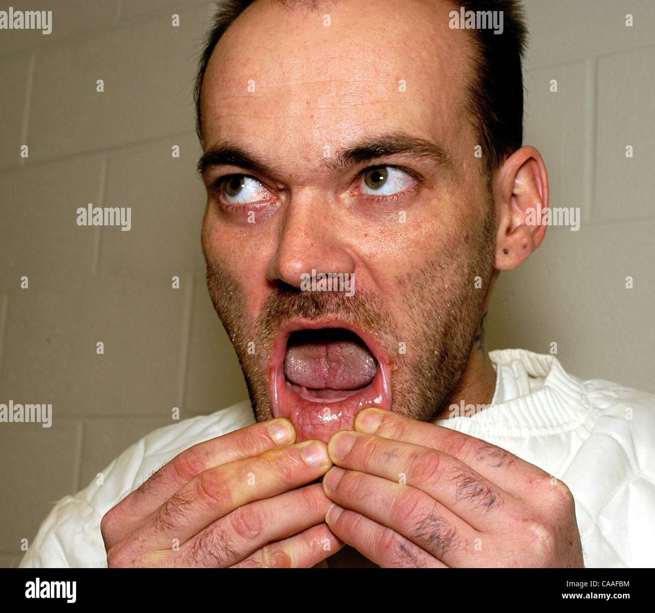 Mar 11, 2004 - Huntsville, AL, USA - A toothless prisoner in the AIDS ...