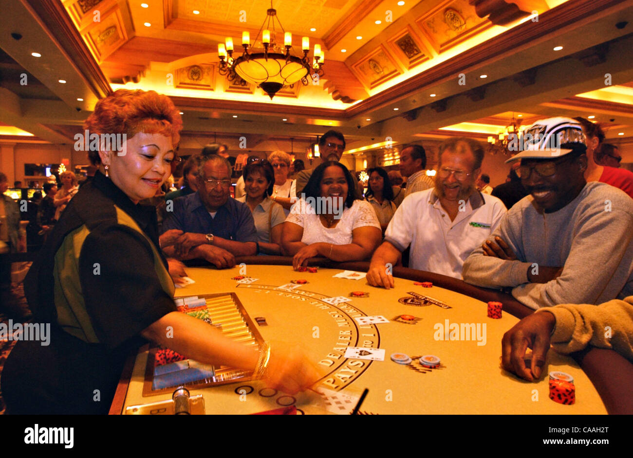 Jun 09, 2003; Lincoln, CA, USA; Cher deals hands of cards at her Blackjack table at the new Thunder Valley Casino near Lincoln, CA on opening day, Monday, June 9, 2003.  The facility has a capacity of 7400 and today it was packed and hundreds who waited outside to get in. Stock Photo