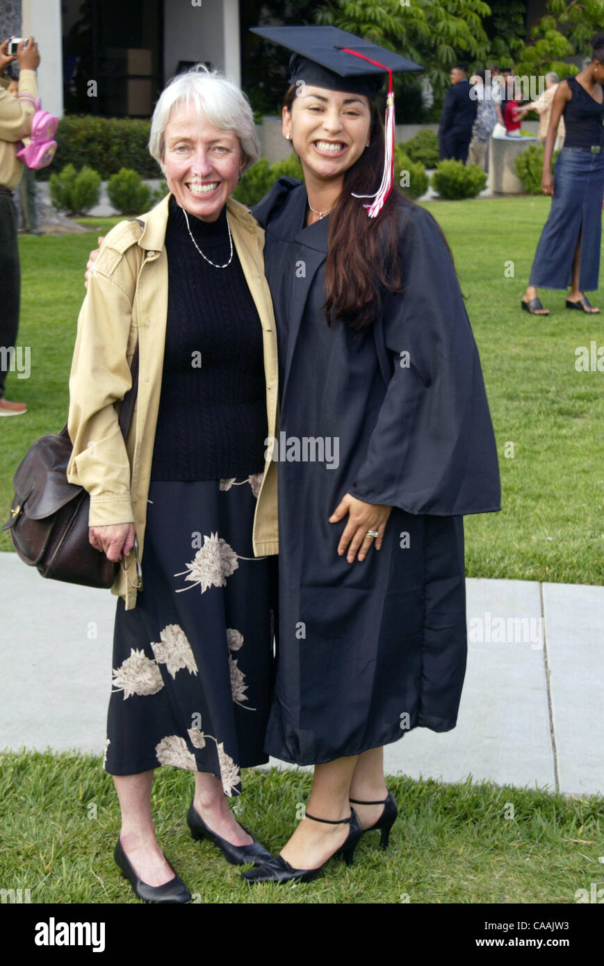 A Hispanic mom graduates from Long Beach CA City College