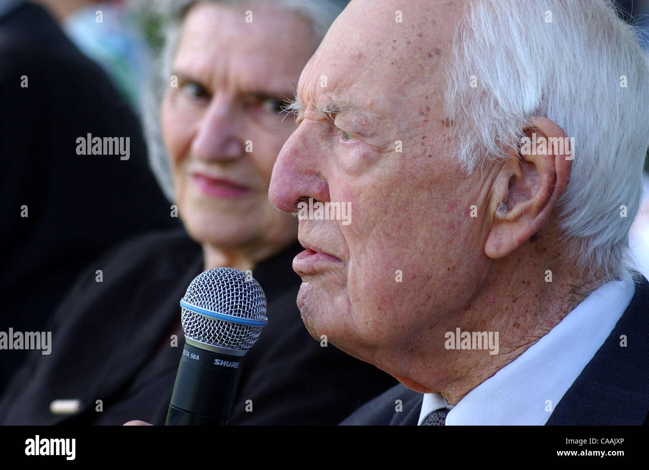 Sep 06, 2003 - Covington, Kentucky, USA - Pioneer Days celebrated 'Pioneer Political Soap Box' at Pioneer Park on KY 17. Speeking to the crowd (forgound) is 100 year old Dr. THOMAS CLARK, who was billed as 'Mr. History of Kentucky', by the event's  host John Stephenson as Clarks wife Loretta listens Stock Photo