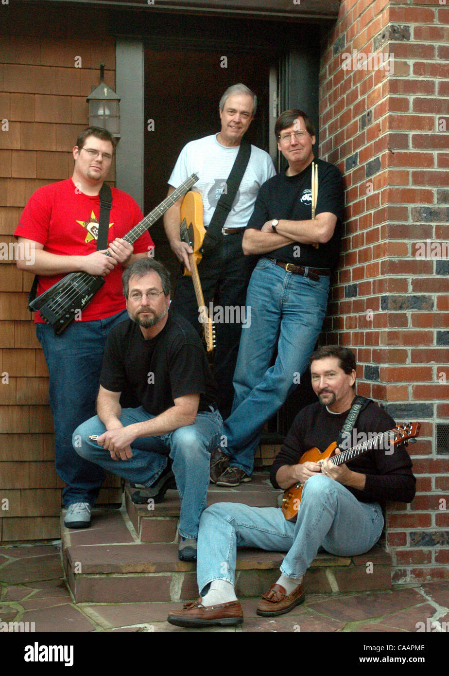 Stone Soup, a rock band made up mostly of guys in their 50's, poses Jan