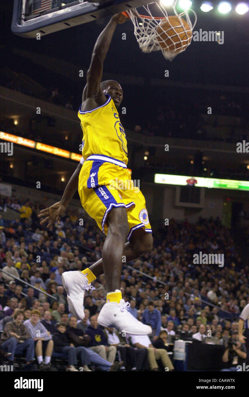Golden State Warriors Jason Richardson 23 Dunks The Ball Against The Utah Jazz In The 1st Quarter Of Their Game On Monday January 19 04 At The Oakland Arena In Oakland Calif Golden State Warriors Jason Richardson 23 Dunks The Ball Against The Utah Jazz In The 1st Quarter Of Their Game On Monday January 19 04 At The Oakland Arena In Oakland Calif