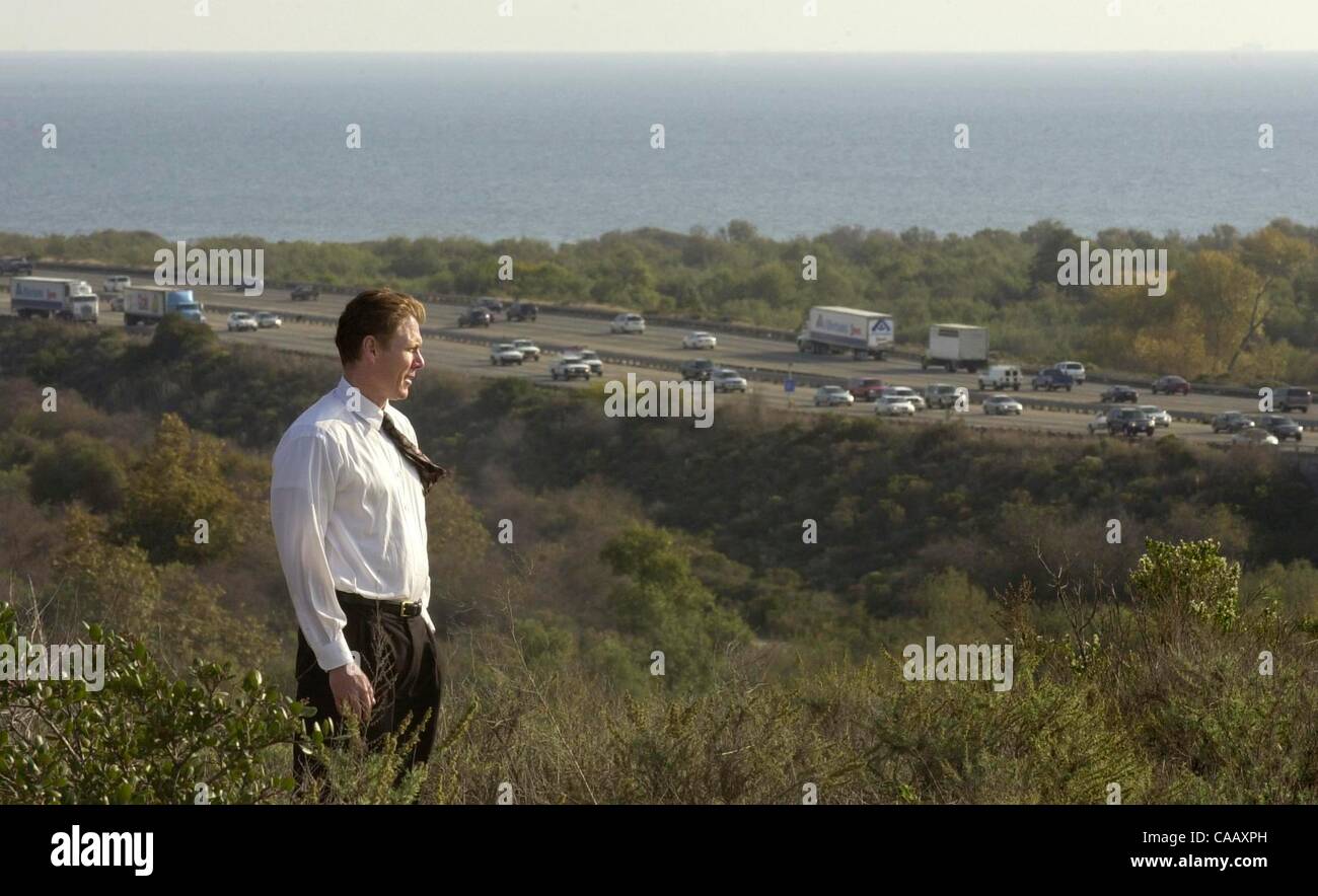 (Published 02/14/2005, A-1)In this view looking southwest PAUL BOPP, Ph.D., of the Transportation Corridor Agencies, stands at an overlook near I-5's Cristianitos Rd. exit at the south end of San Clemente where the south end of one of his org.'s proposed tollway routes would be passing by. The eleva Stock Photo