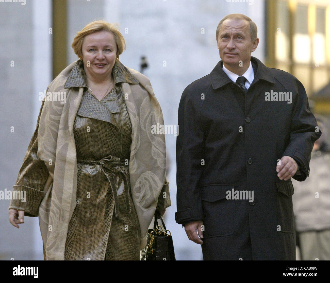Presidential elections of the Russian Federation. The president of the Russian Federation Vladimir Putin with wife Lyudmila Putinoj near a polling district 2039. Stock Photo