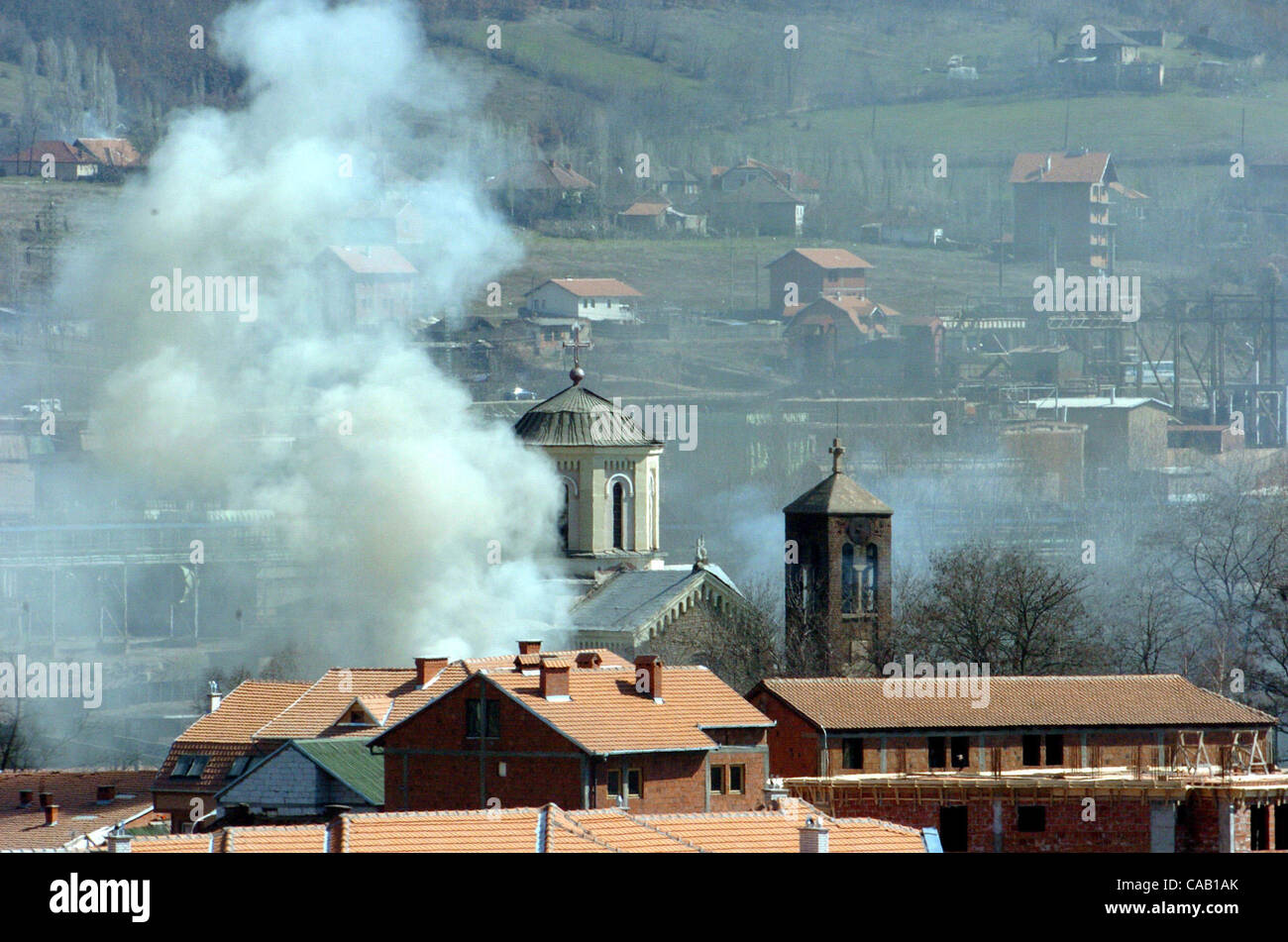 Mar 22, 2004; Kosovo, SERBIA; The Serb Orthodox Church of St. Sava burns after being set on fire by angry Kosovo Albanian protesters, in the South part of Kosovska Mitrovica. The worst ethnic violence since the 1998-1999 Kosovo war erupted here and spread to other parts of the troubled province in s Stock Photo