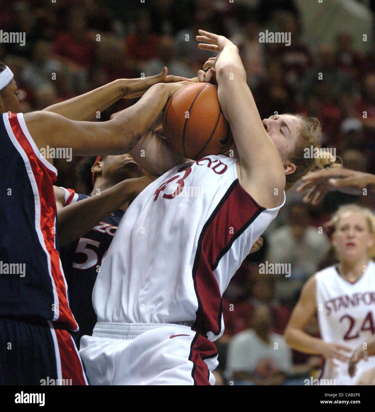 Stanford's Kristen Newlin (cq, right) has her shot rejected by Arizona