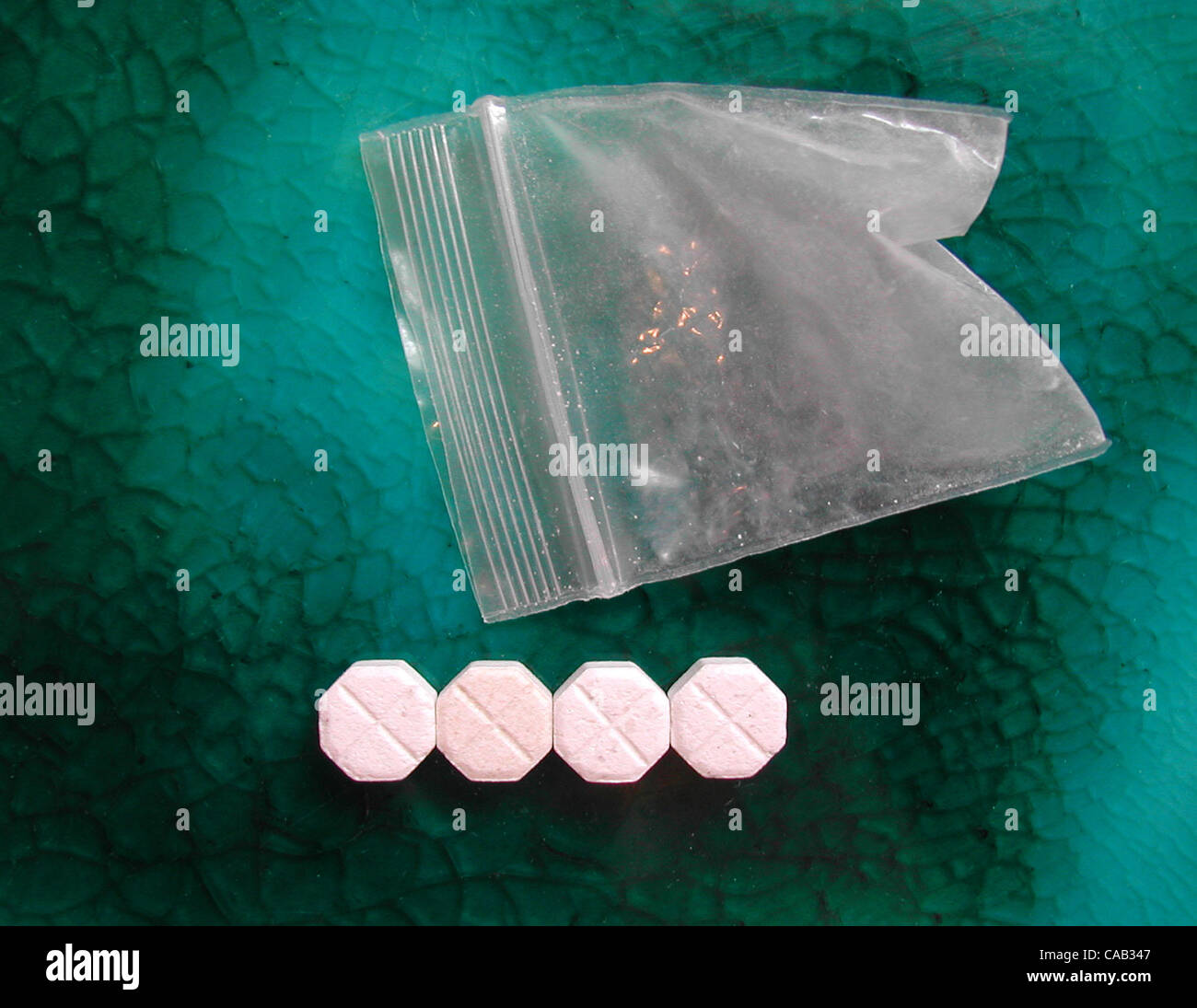 Apr 09, 2004; Los Angeles, CA, USA; MDMA (3-4 methylenedioxymethamphetamine) is a synthetic, psychoactive drug chemically similar to the stimulant methamphetamine and the hallucinogen mescaline. Street names for MDMA include Ecstasy, Adam, XTC, hug, beans, and love drug. In 2002, an estimated 676,00 Stock Photo