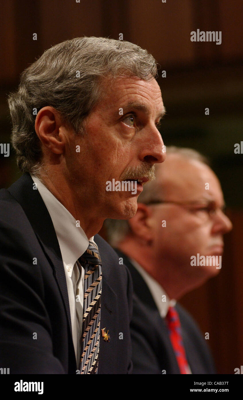 Washington D.C. - Former Acting Director of the FBI Thomas Pickard and Ambassador J. Cofer Black testify before the September 11 Commission in the Hart Senate Buliding on April 13, 2004.   United States Stock Photo