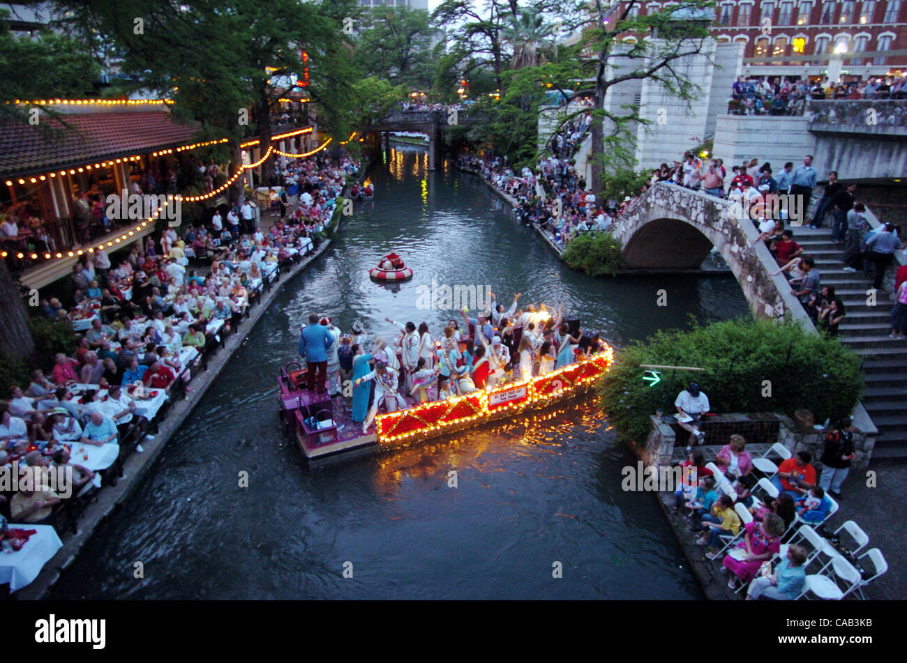 Rey Feo's float passes by spectators near Commerce street bridge duirng the Texas Cavalier ' LUCES DEL RIO' River Parade headed toward the lagoon Monday April 19, 2004 . photo by Edward A. Ornelas Stock Photo