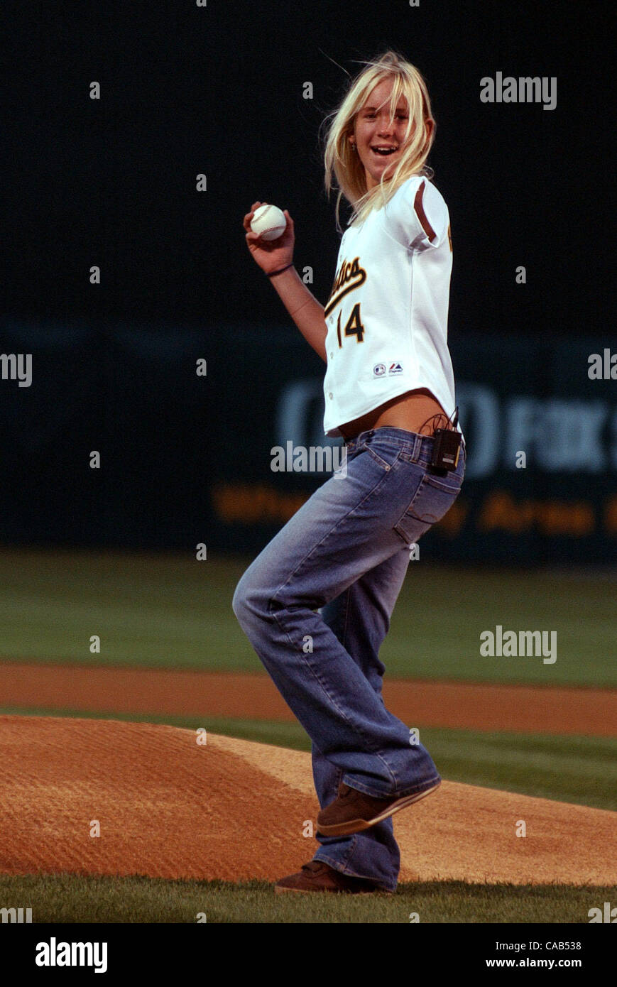 Bethany Hamilton, age 14, throws out the first pitch of ...