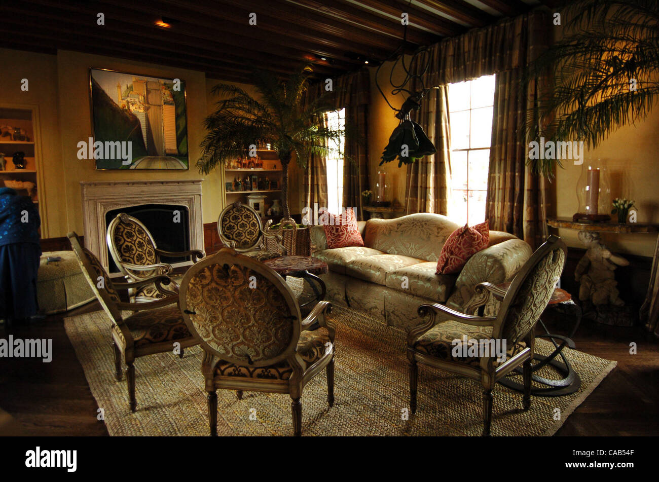 The 2004 San Francisco Decorator Showcase house is a 11,000 square foot home at 2516 Pacific, a former residence of the consul general of Great Britian. Thomas Bartlett Interiors decorated the living room, employing the color palette found in the Wayne Thiebaud painting featured above the fireplace. Stock Photo