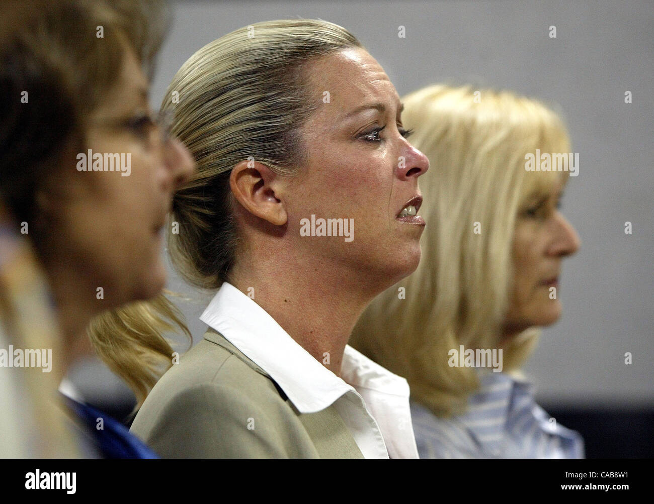 052104 WEST PALM BEACH -  Heather Hill, former fiancee of prominent developer Daniel Catalfumo, listens as a judge does not accept a plea bargain in a domestic battery case against him at the Palm Beach County Courthouse Monday.   Hill was injured a 2003 fight in which she required 150 sutures in he Stock Photo