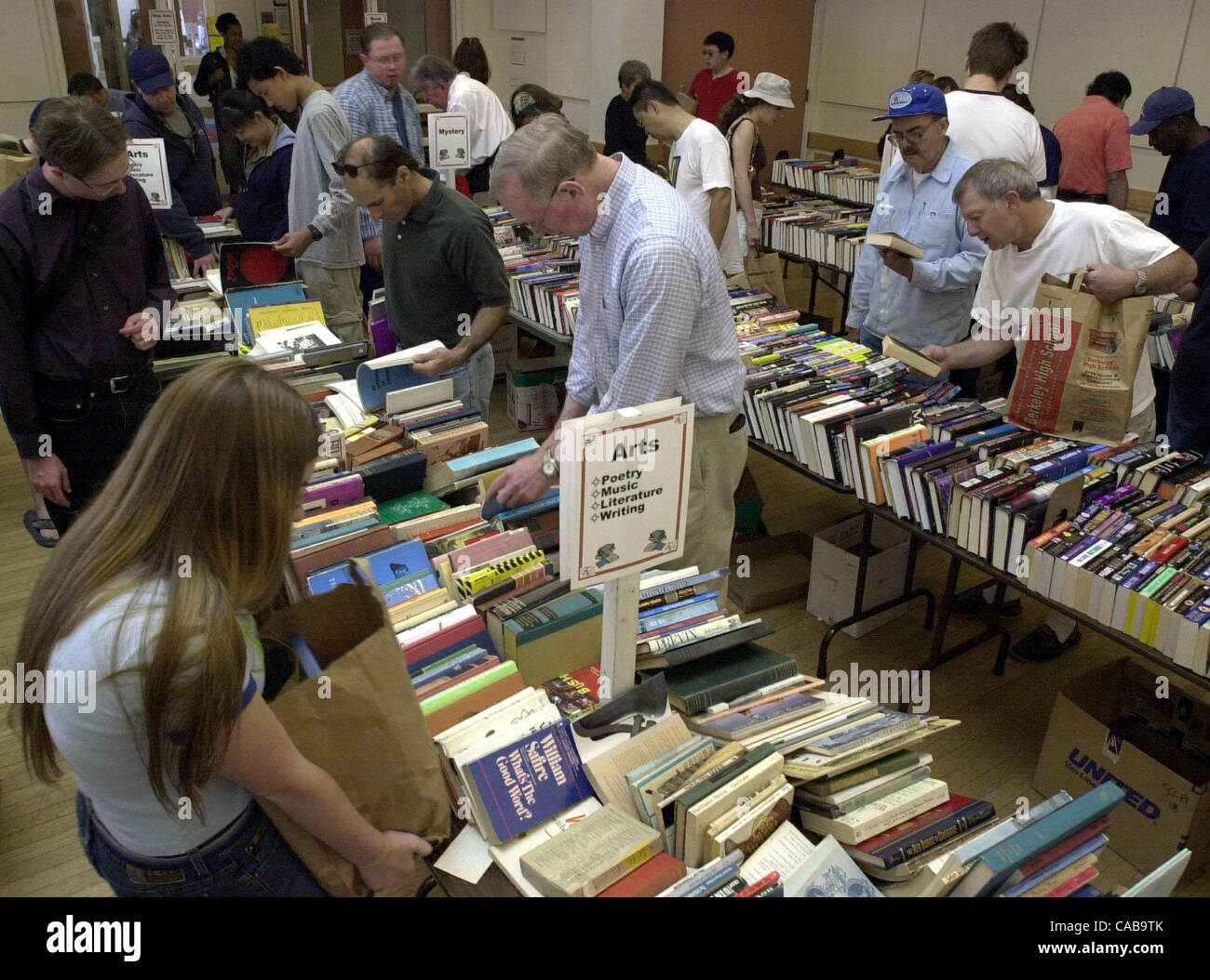 People browse and buy books at the Friends of Albany Library book sale