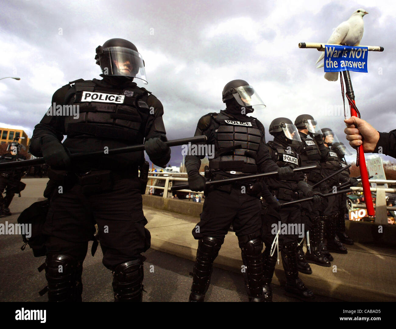 Mar 15, 2003 - Portland, Oregon, U.S. - Portland riot police stand their ground as they block the end of the Morrison Bridge from anti-war protesters ho had vered off from their designed parade route in an effort to disrupt traffic. (Credit Image: © L.E. Baskow/ZUMApress.com) Stock Photo