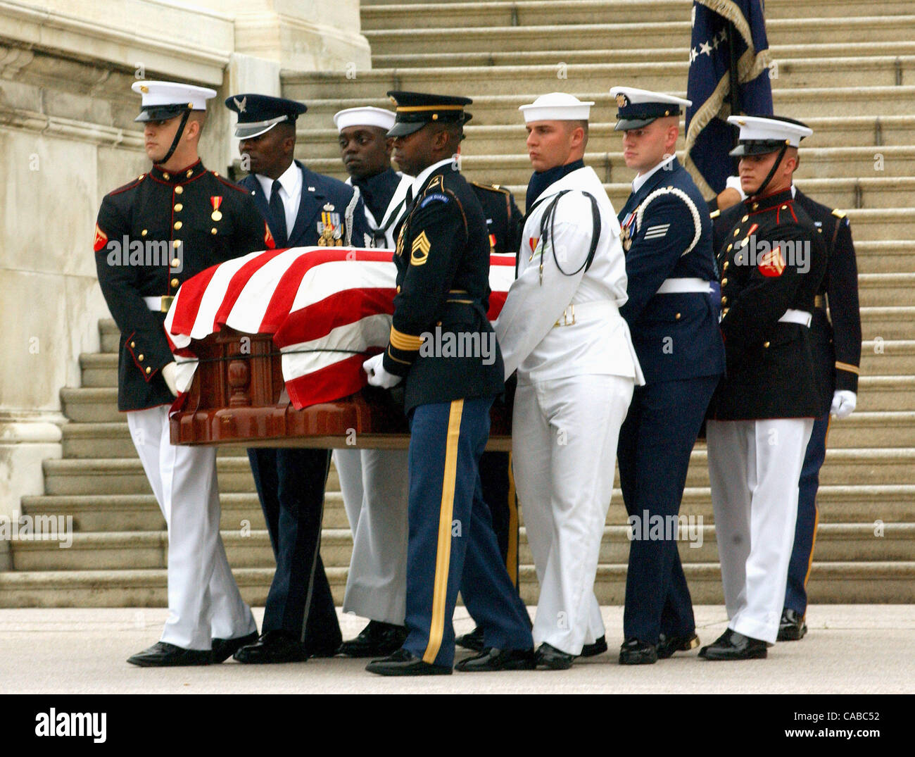 The casket of former President Ronald Reagan is escorted down the steps ...