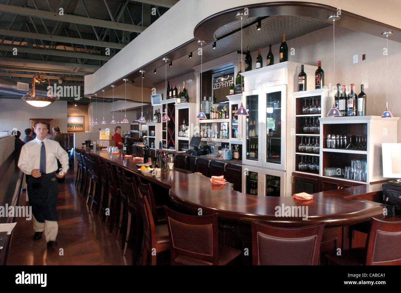 Photo of the bar Thursday, June 10, 2004, at Zephyr Grill and Bar in  Livermore, Calif. Everyone was busy training for their imminent opening.  (Contra Costa Times/Bob Pepping Stock Photo - Alamy