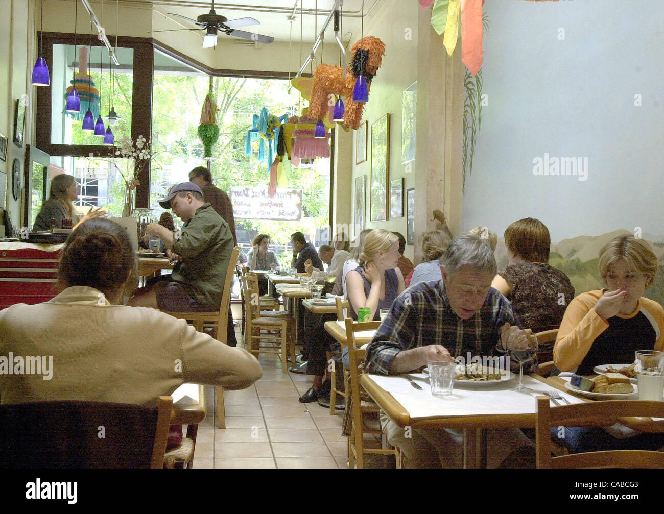 The Lunch Crowd Fills Up The Phoenix Next Door Restaurant In Stock
