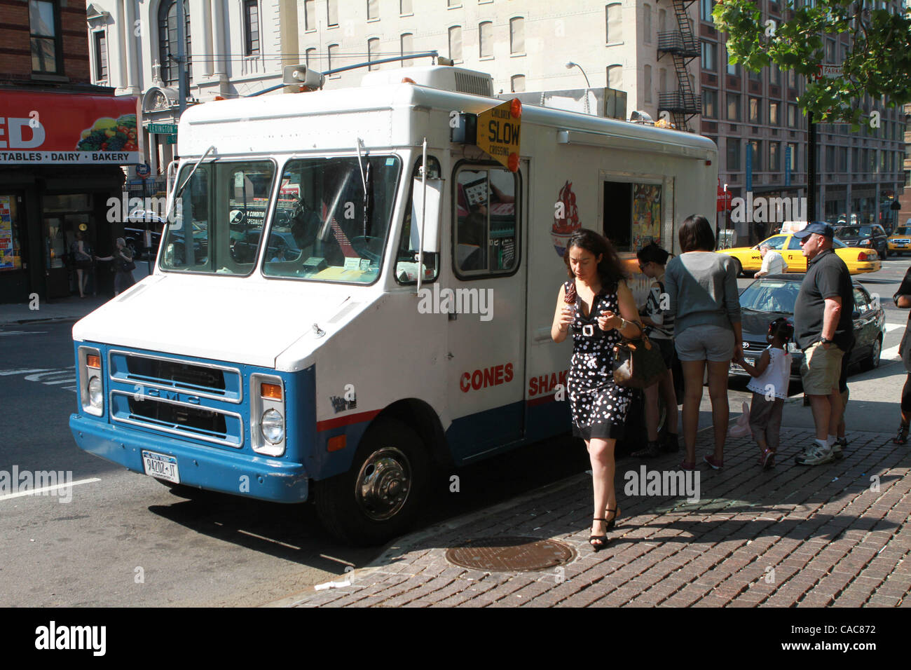 Ice cream truck idling on Lexington Ave. and East 96th. St. in front of playground and school